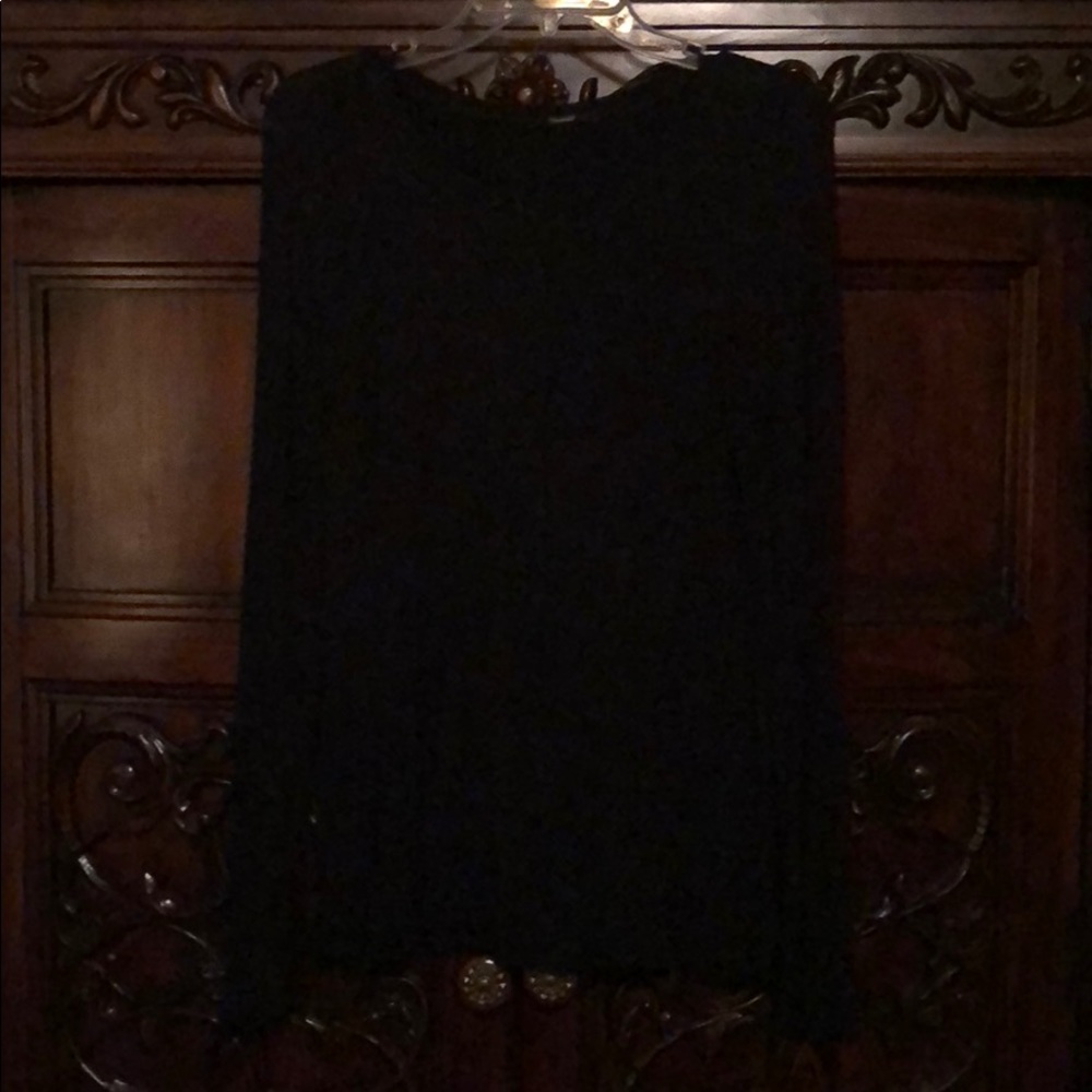 Black long sleeve shirt. Soft and flows well.